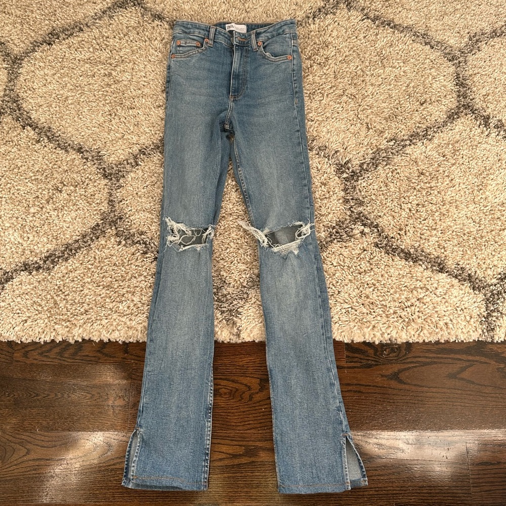 Zara split high waisted jeans! SO comrfortable. Never worn.